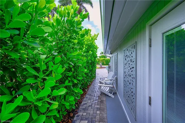 a backyard of a house with lots of green space