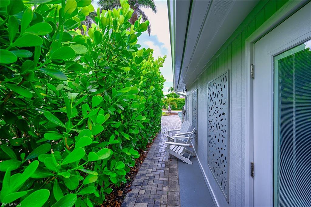 757 101st Avenue North Naples, FL 34108 - Photo 22 of 33 a backyard of a house with lots of green space