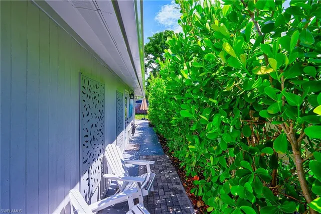 a backyard of a house with lots of green space