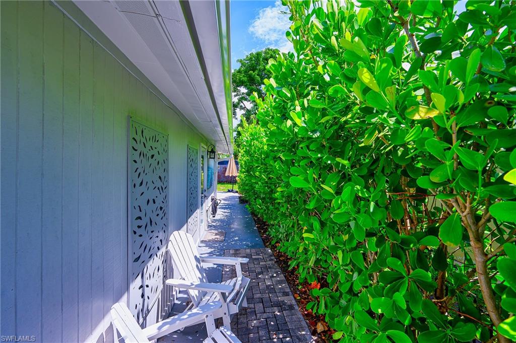 757 101st Avenue North Naples, FL 34108 - Photo 23 of 33 a backyard of a house with lots of green space