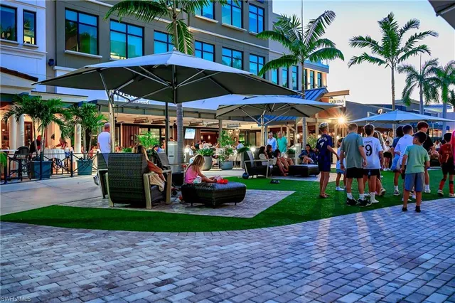 a view of street with sitting area