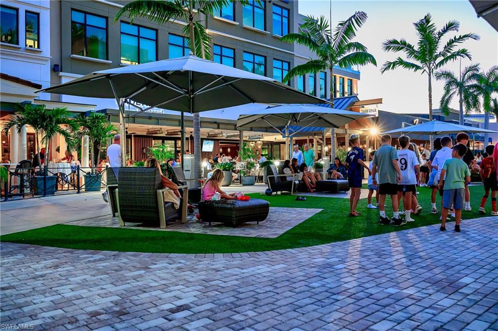 757 101st Avenue North Naples, FL 34108 - Photo 26 of 33 a view of street with sitting area