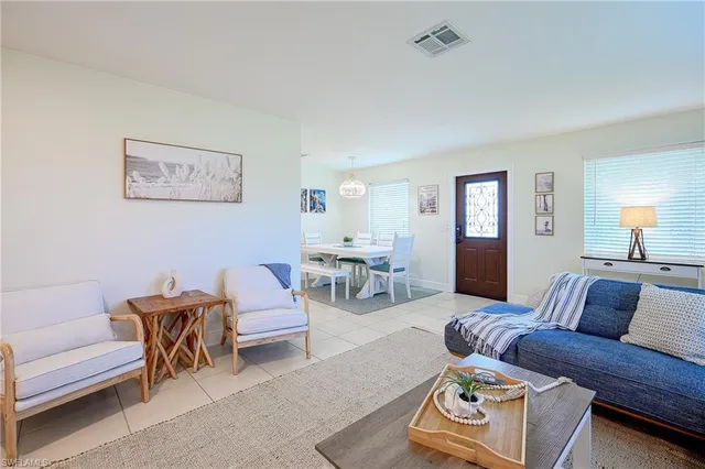 a living room with furniture and a couch