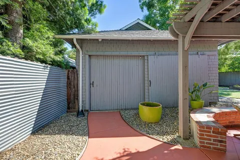 a view of a patio in backyard