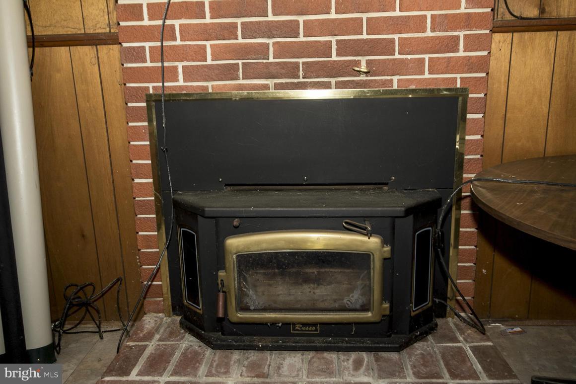 4042 Carthage Road Randallstown, MD 21133 - Photo 23 of 26 Wood Stove