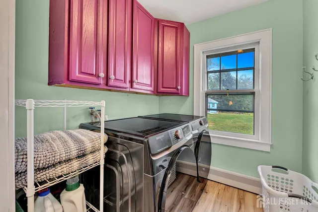 a room that has a bed and a chair in it