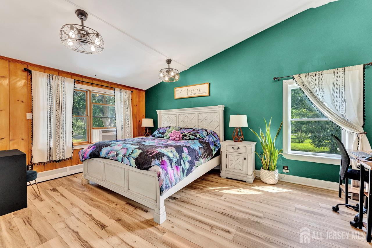 254 Friendship Road Monmouth Junction, NJ 08852 - Photo 16 of 33 a bedroom with a bed and a large window