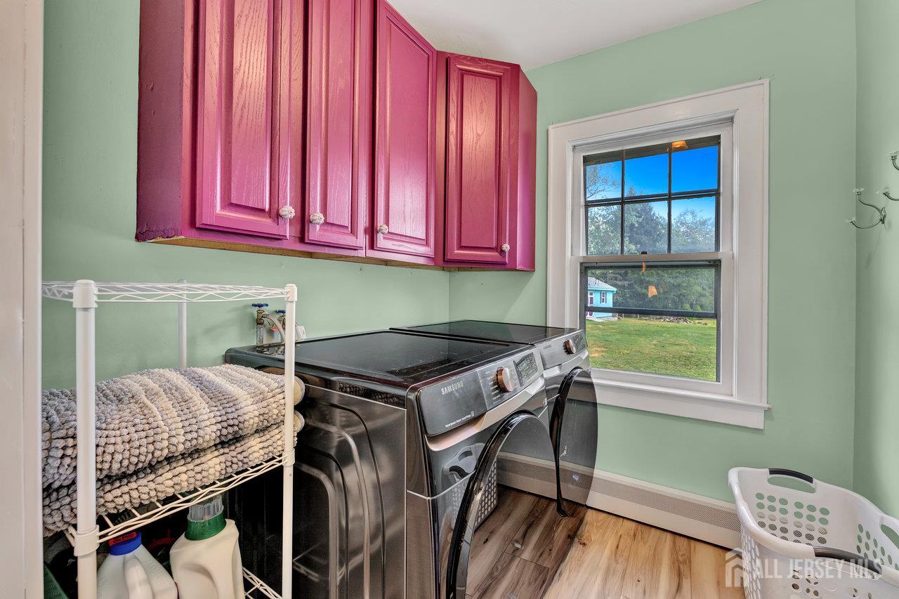 254 Friendship Road Monmouth Junction, NJ 08852 - Photo 20 of 42 a room that has a bed and a chair in it