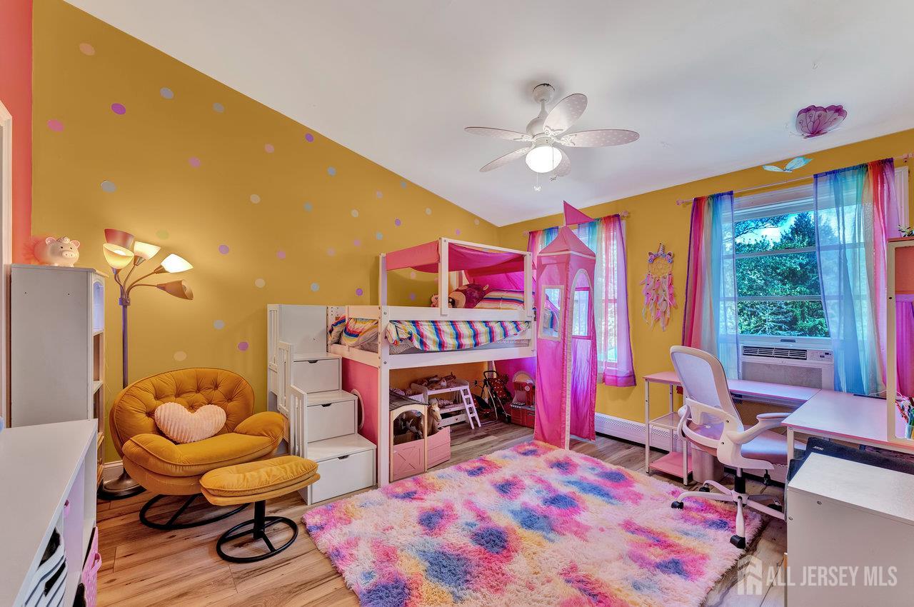 254 Friendship Road Monmouth Junction, NJ 08852 - Photo 23 of 33 a bed room with a bed and a chair