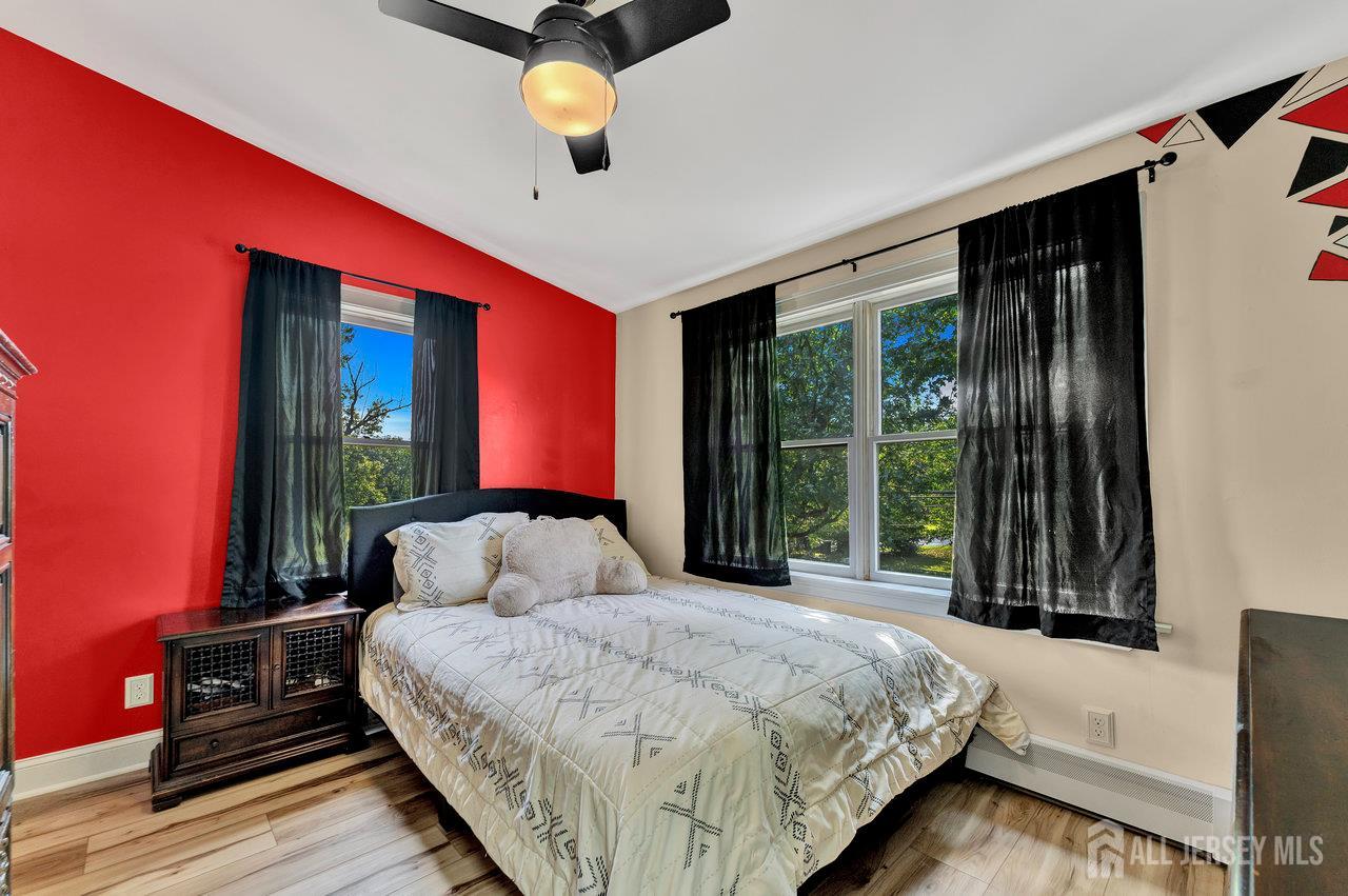 254 Friendship Road Monmouth Junction, NJ 08852 - Photo 24 of 42 a bedroom with a large bed and a window