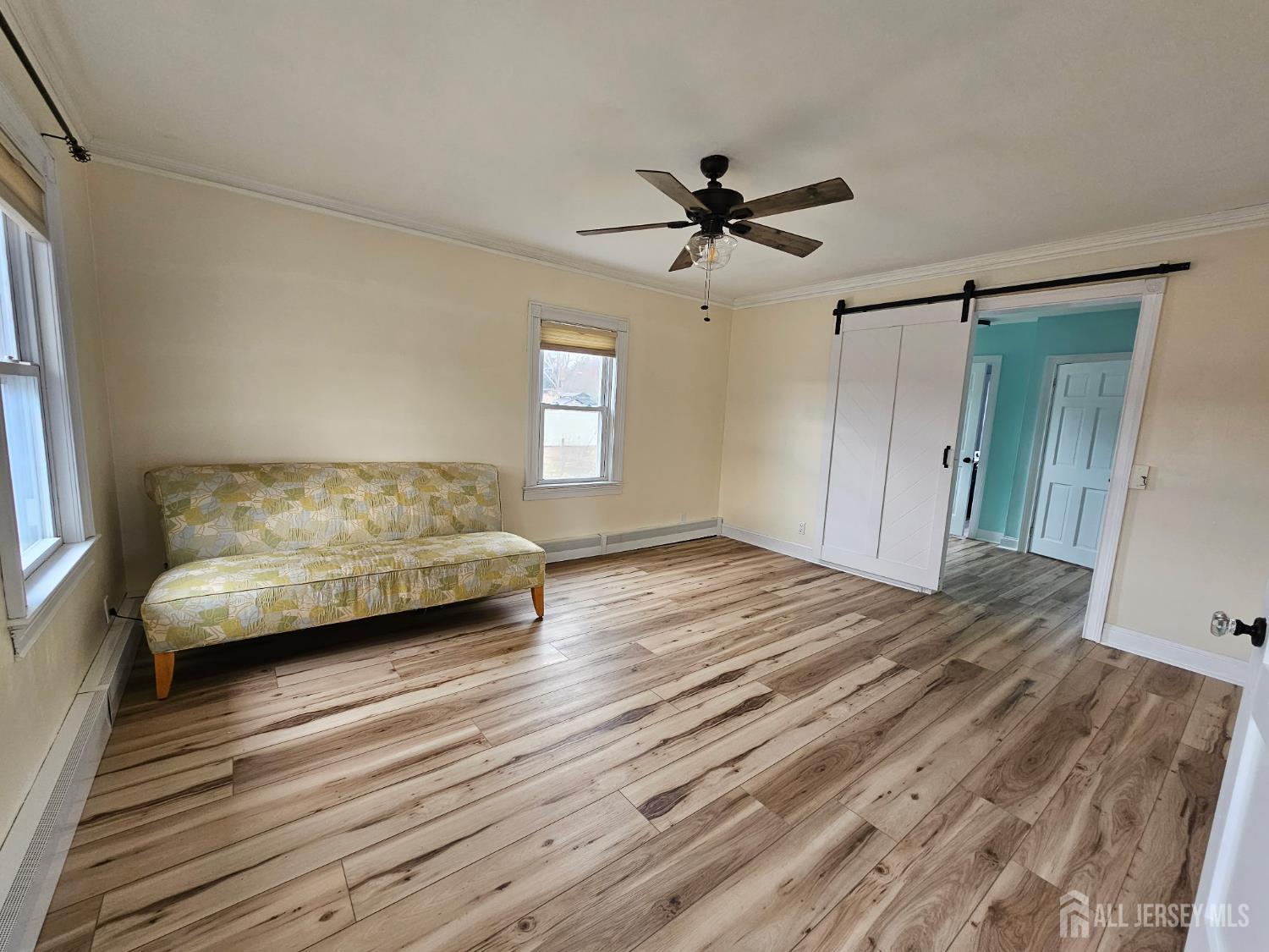254 Friendship Road Monmouth Junction, NJ 08852 - Photo 3 of 42 a view of a bedroom with furniture and a ceiling fan