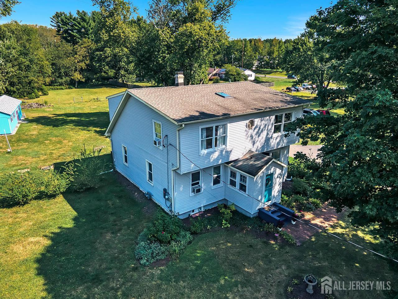 254 Friendship Road Monmouth Junction, NJ 08852 - Photo 35 of 42 a view of a house with a yard