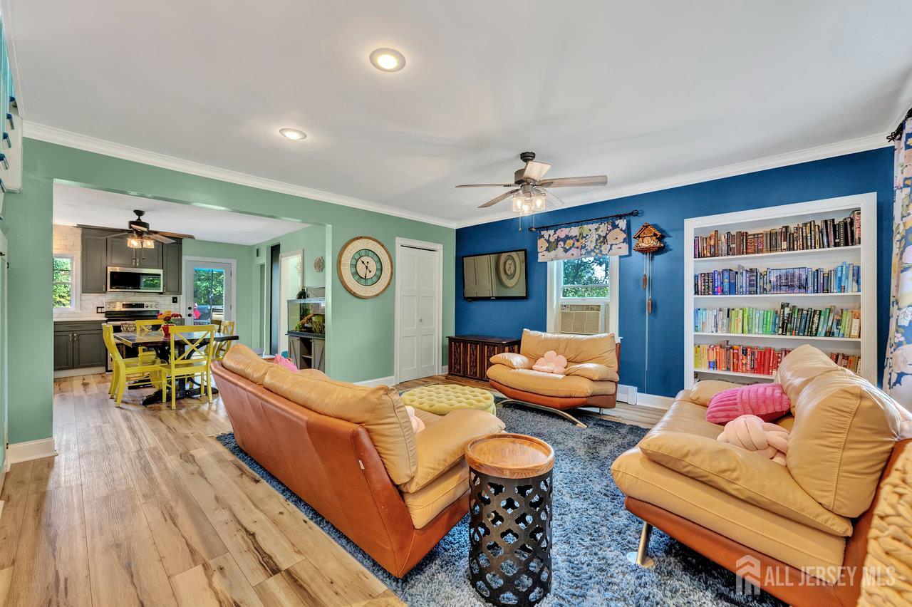 254 Friendship Road Monmouth Junction, NJ 08852 - Photo 5 of 33 a living room with furniture and a large window