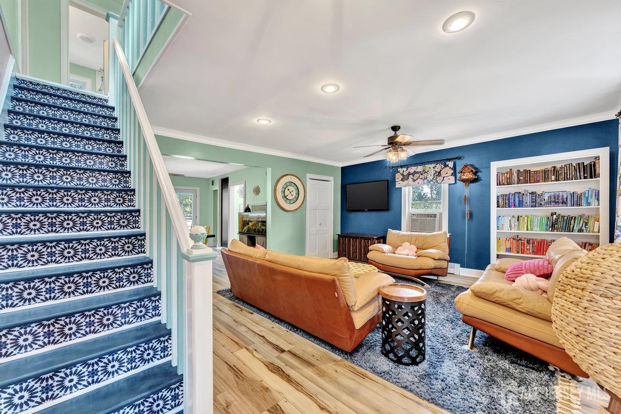254 Friendship Road Monmouth Junction, NJ 08852 - Photo 6 of 33 a living room with furniture a rug and a large window