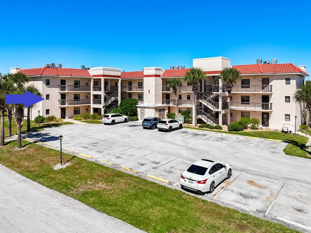 a front view of a building with street view