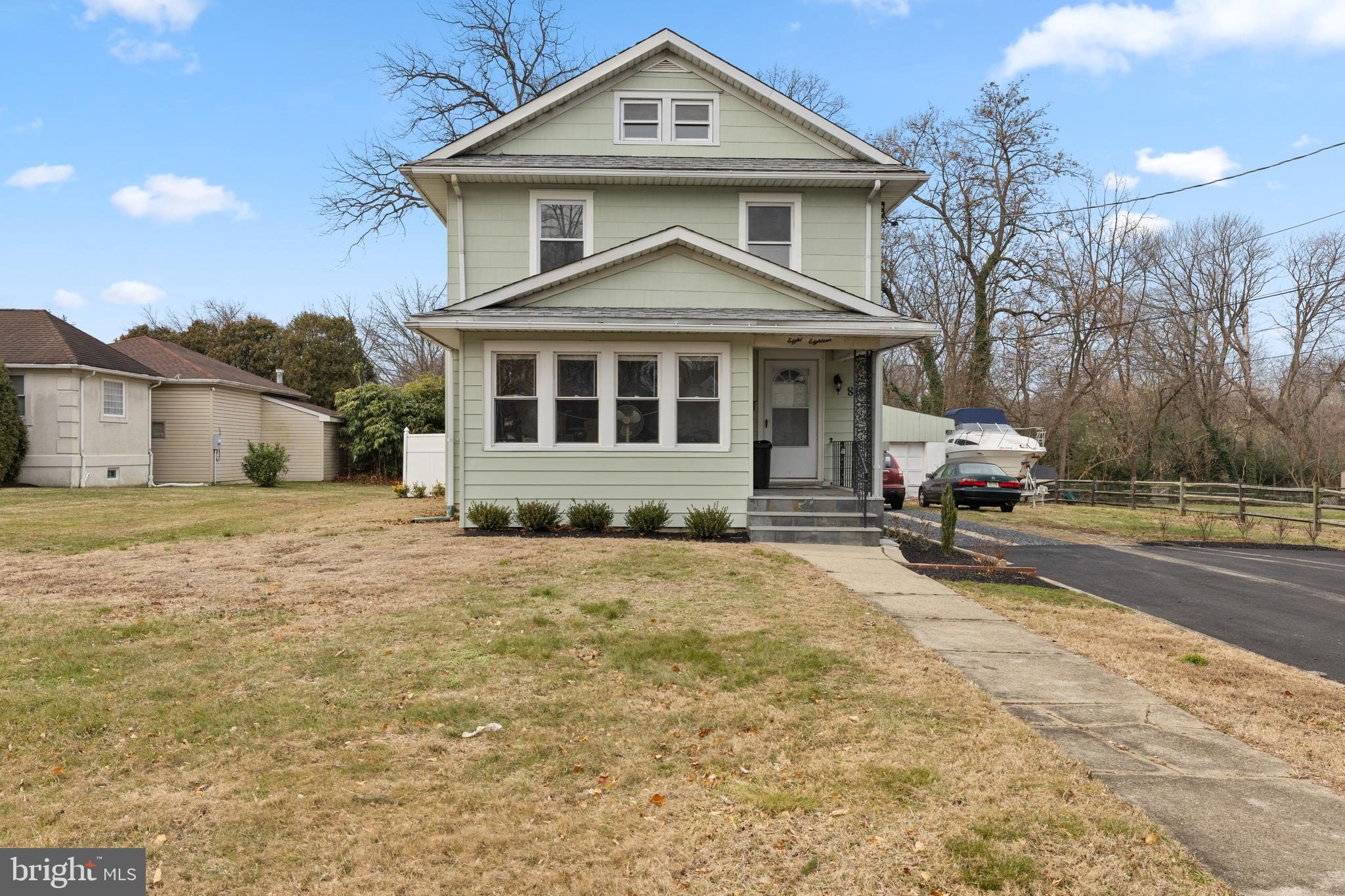 818 Stiles Avenue Maple Shade, NJ 08052 - Photo 1 of 11 a front view of a house with a yard