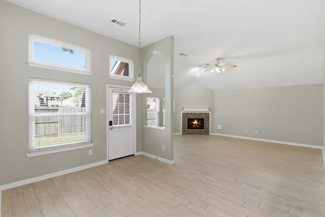 a view of a kitchen counter space and wooden floor