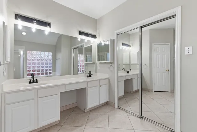 a bathroom with a bathtub and window