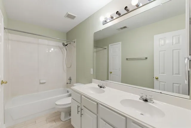 a front of a house with a yard