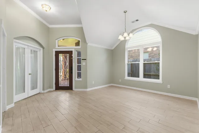 a view of livingroom with window and hardwood floor