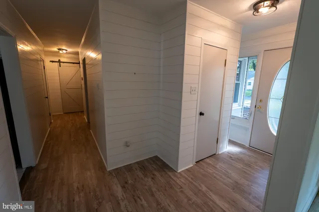 a bathroom with a sink vanity and a mirror