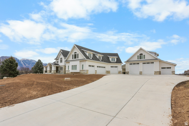 1354 South 800 East Mapleton, UT 84664 - Photo 121 of 129 Modern inspired farmhouse featuring board and batten siding, stone siding, driveway, and a mountain view