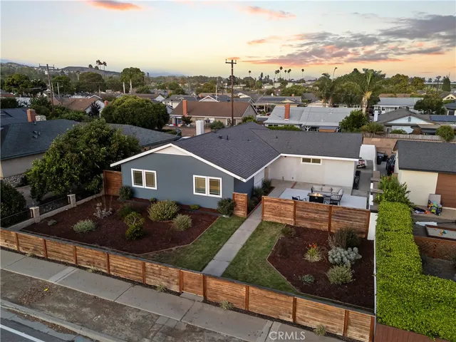 an aerial view of a house with a garden view