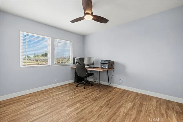 a workspace with wooden floor