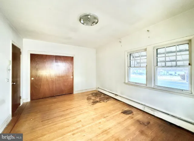 an empty room with windows