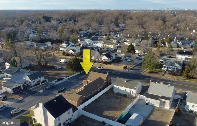 an aerial view of a yard with horses