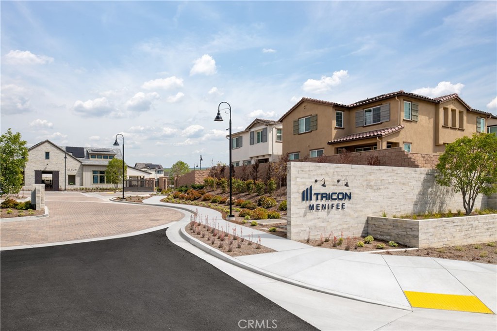 28201 Cookhouse Lane Menifee, CA 92584 - Photo 27 of 32 a view of multiple houses with a street