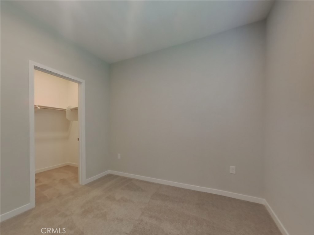 28201 Cookhouse Lane Menifee, CA 92584 - Photo 8 of 32 a view of an empty room