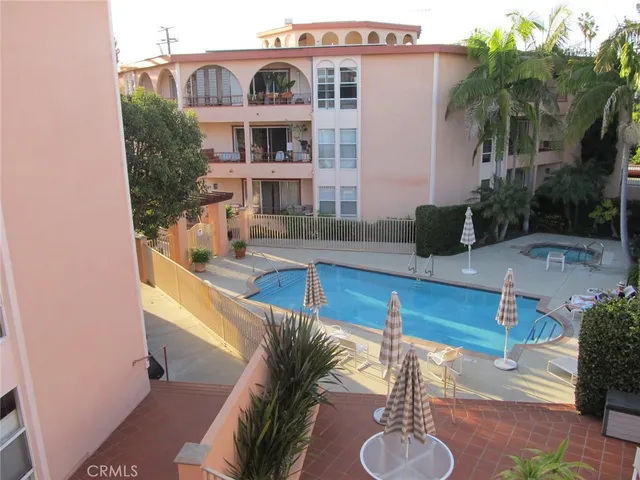 a view of a house with swimming pool