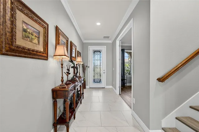 a large kitchen with stainless steel appliances kitchen island granite countertop a sink and cabinets
