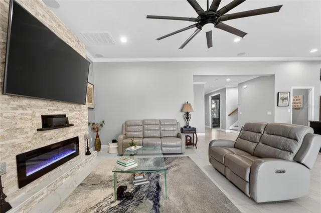 a bathroom with a granite countertop sink toilet a mirror and shower