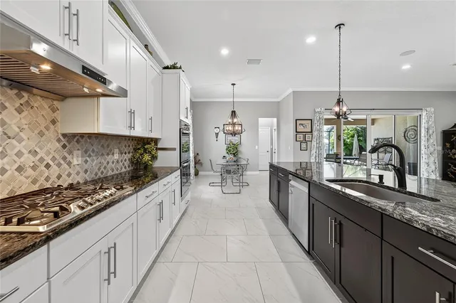 a bedroom with a large bed and a book shelf