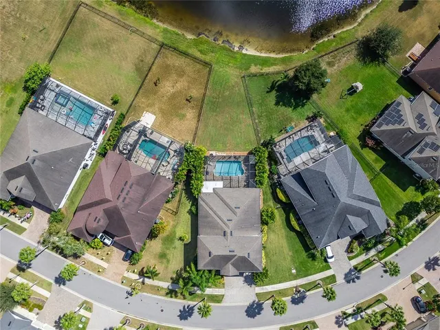 an aerial view of a house with a garden