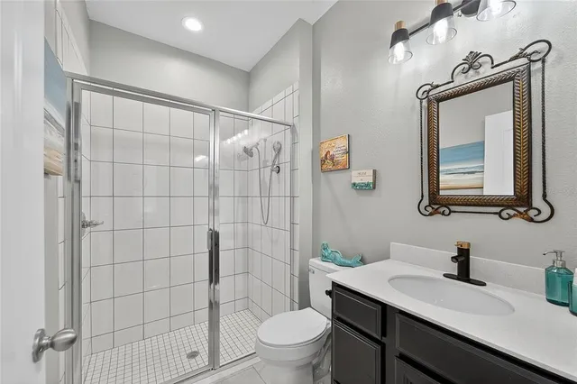 a view of a livingroom and a dining room with furniture window and wooden floor