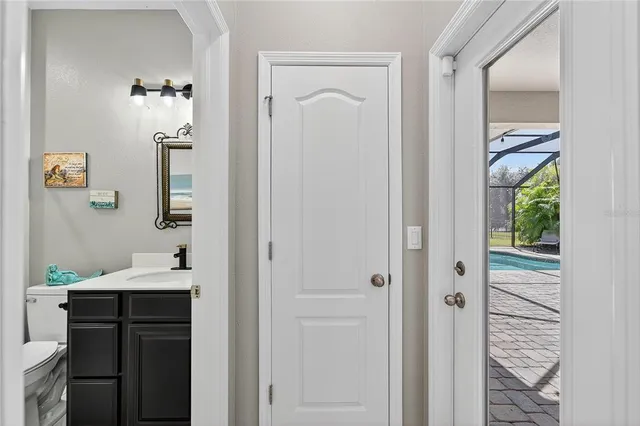 a view of a livingroom with furniture and a window