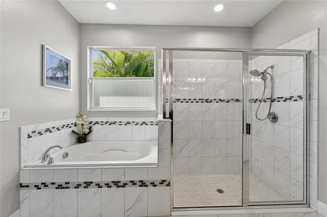 a view of a swimming pool with a patio