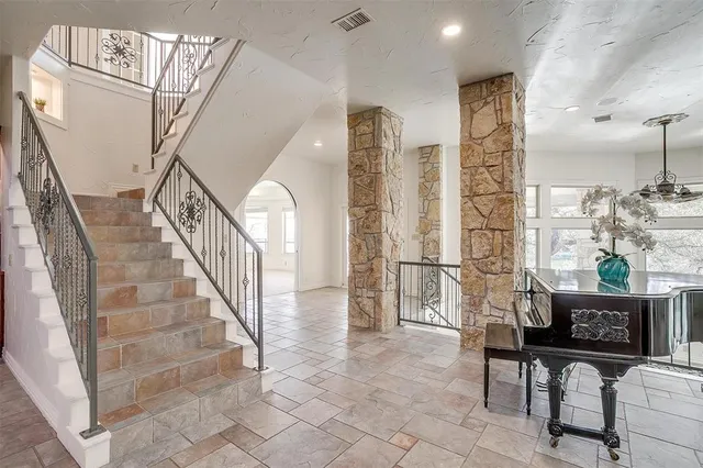 a view of livingroom with furniture and stairs