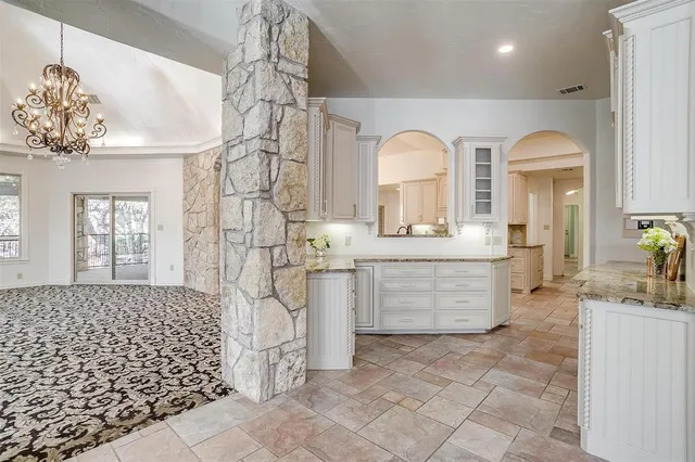 a bathroom with a sink a mirror and a shower