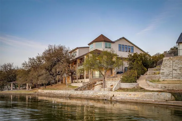 a view of a house with a ocean view