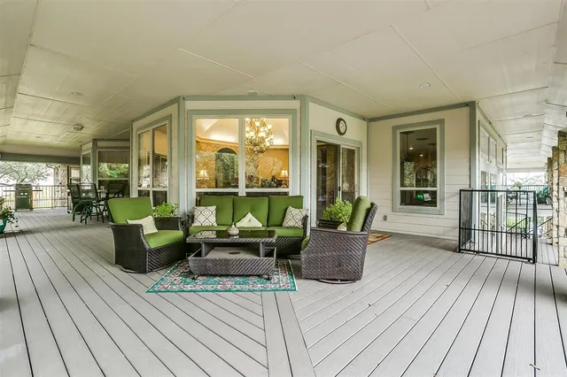 a living room with couch and wooden floor