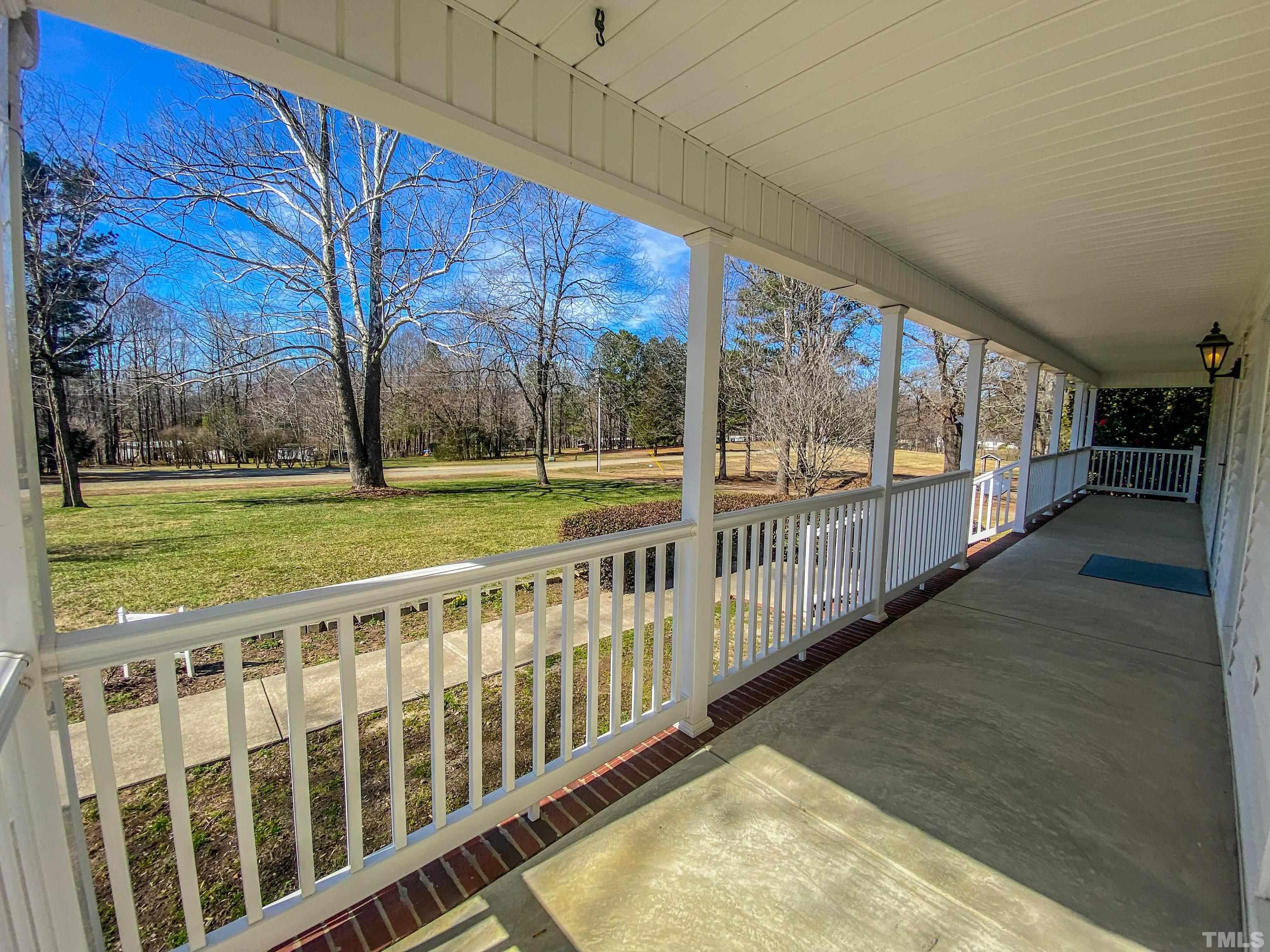 3572 Deerfield Road Stem, NC 27581 - Photo 8 of 62 a view of a room with wooden floor and fence