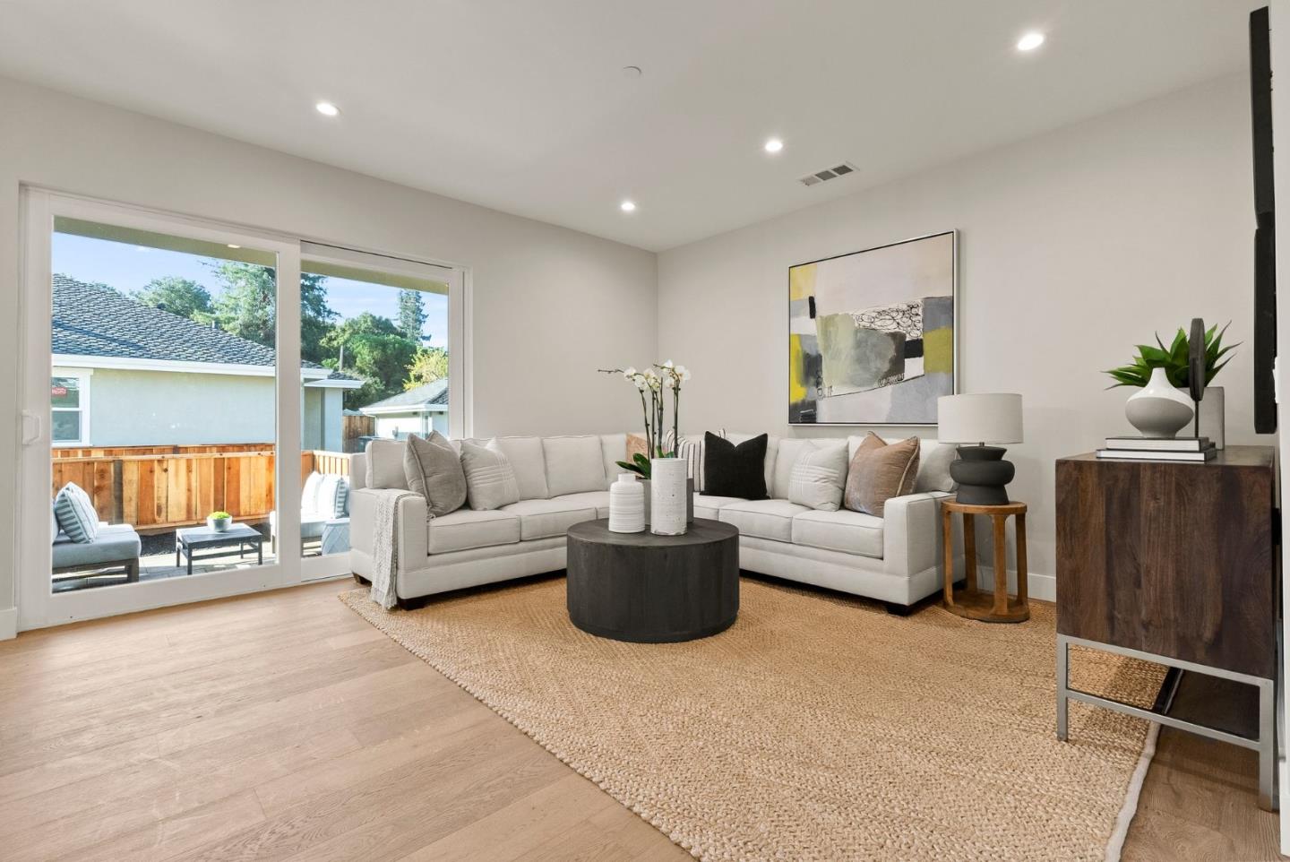 275 Willow Road Menlo Park, CA 94025 - Photo 16 of 40 a living room with furniture and a large window