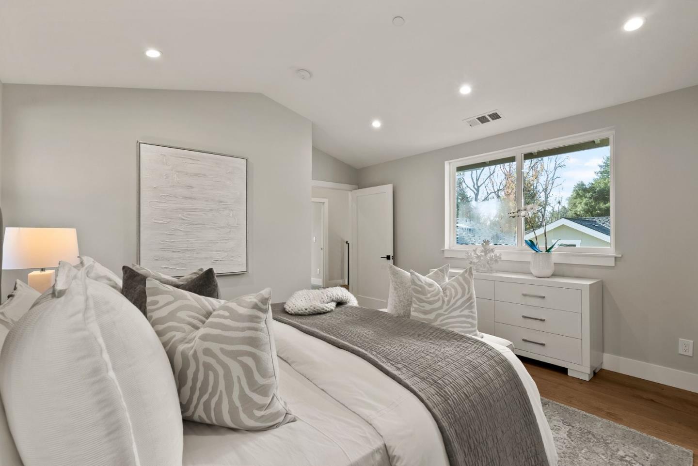 275 Willow Road Menlo Park, CA 94025 - Photo 22 of 40 a bedroom with a bed and a window