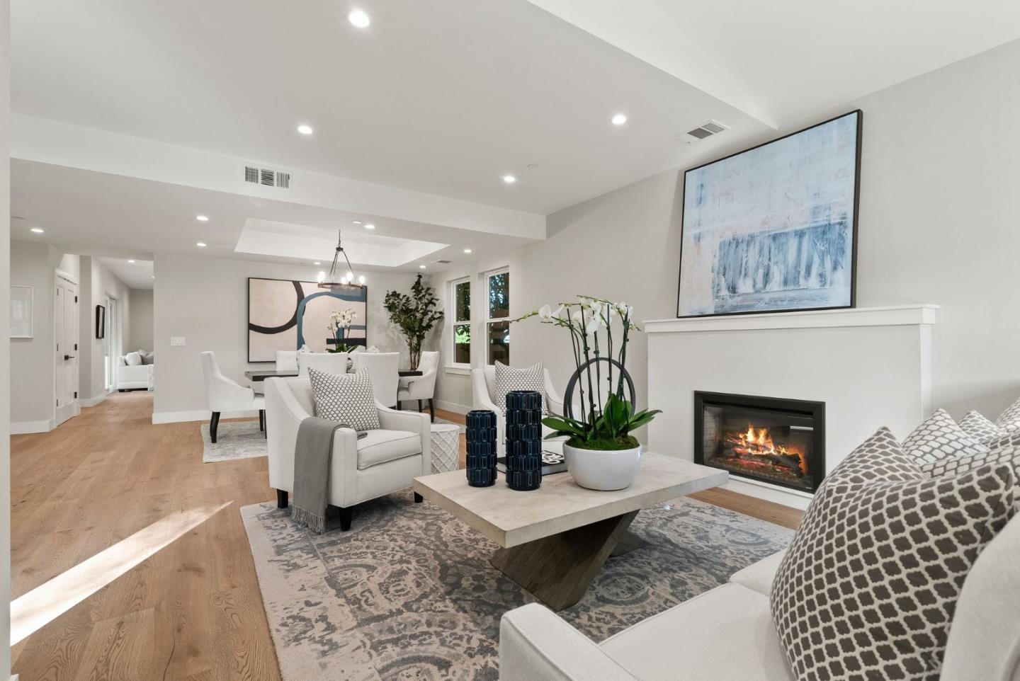 275 Willow Road Menlo Park, CA 94025 - Photo 4 of 40 a living room with furniture and a fireplace