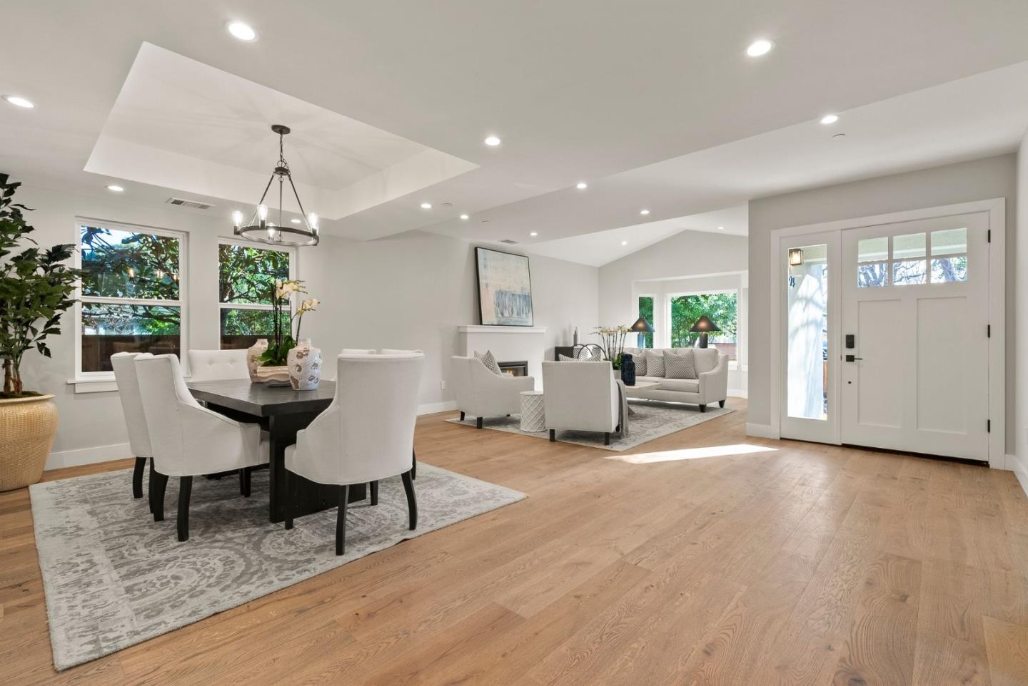 275 Willow Road Menlo Park, CA 94025 - Photo 6 of 40 a living room with furniture and a chandelier