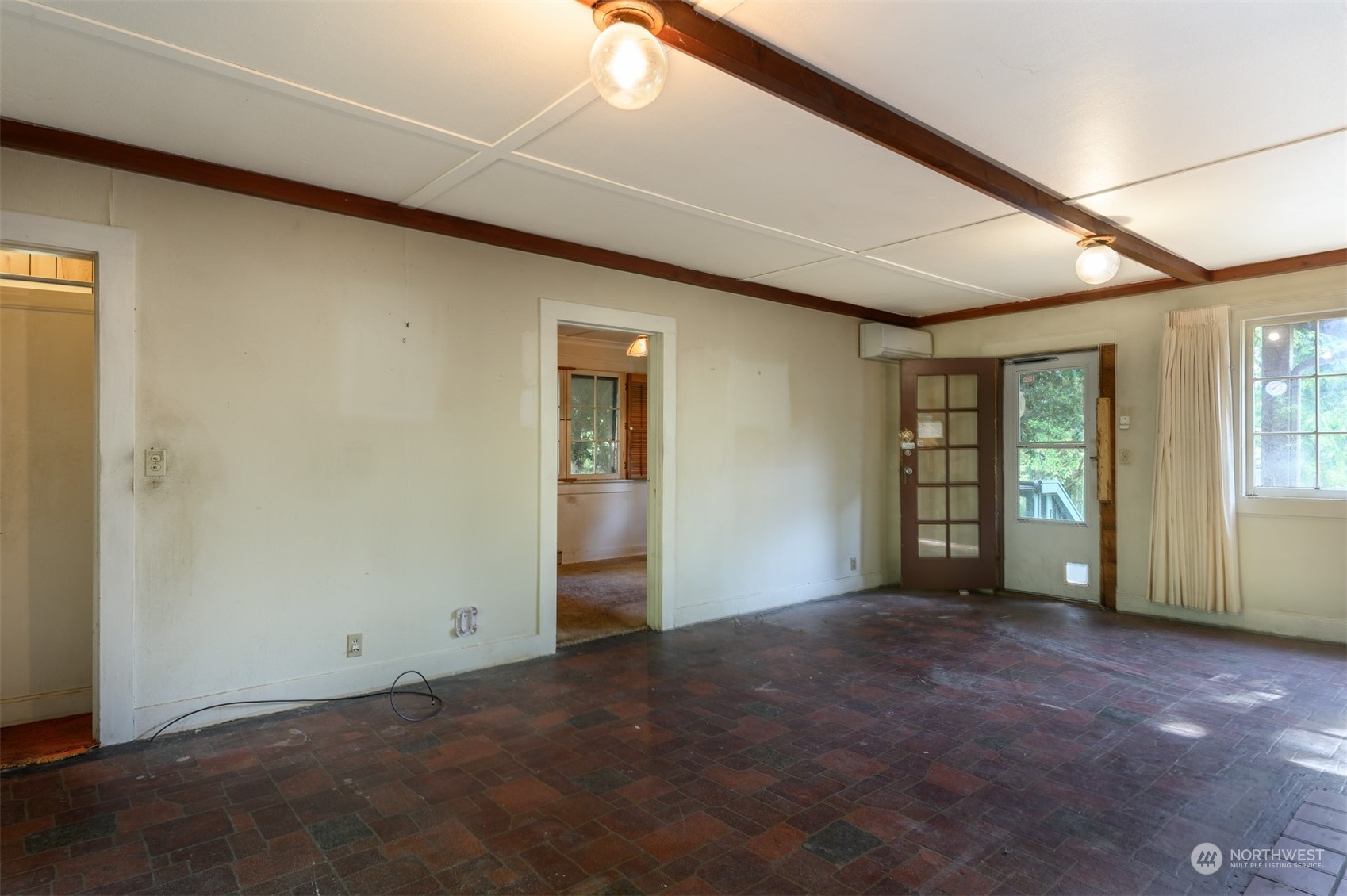 209 Southwest 132nd Street Burien, WA 98146 - Photo 13 of 27 an empty room with windows